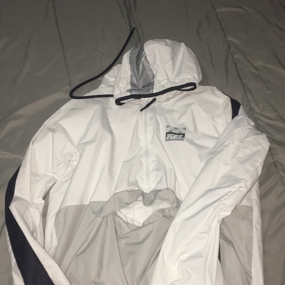 White VS rain jacket